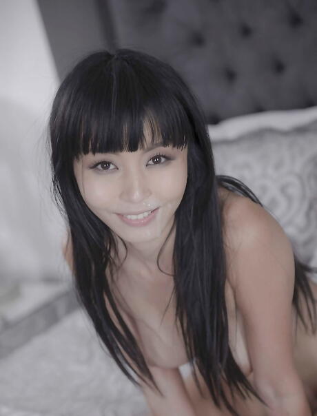 Curious japanese milf Marica Hase work on big black shaft and takes a cumshot on face 